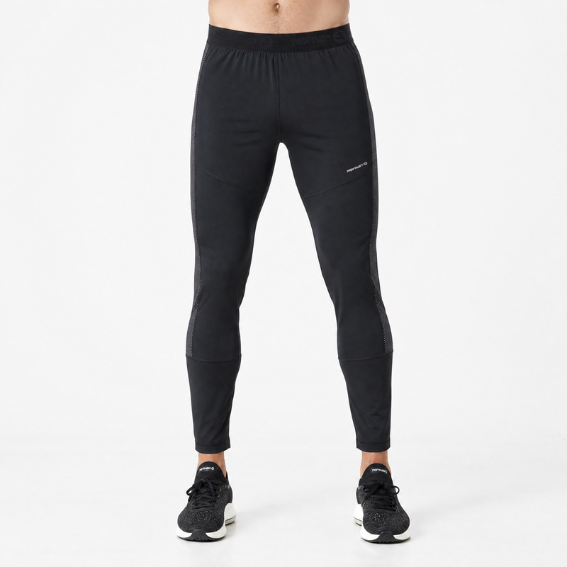 Pantalones deportivos ajustados con ribetes reflectantes y capa base de compresión para hombre