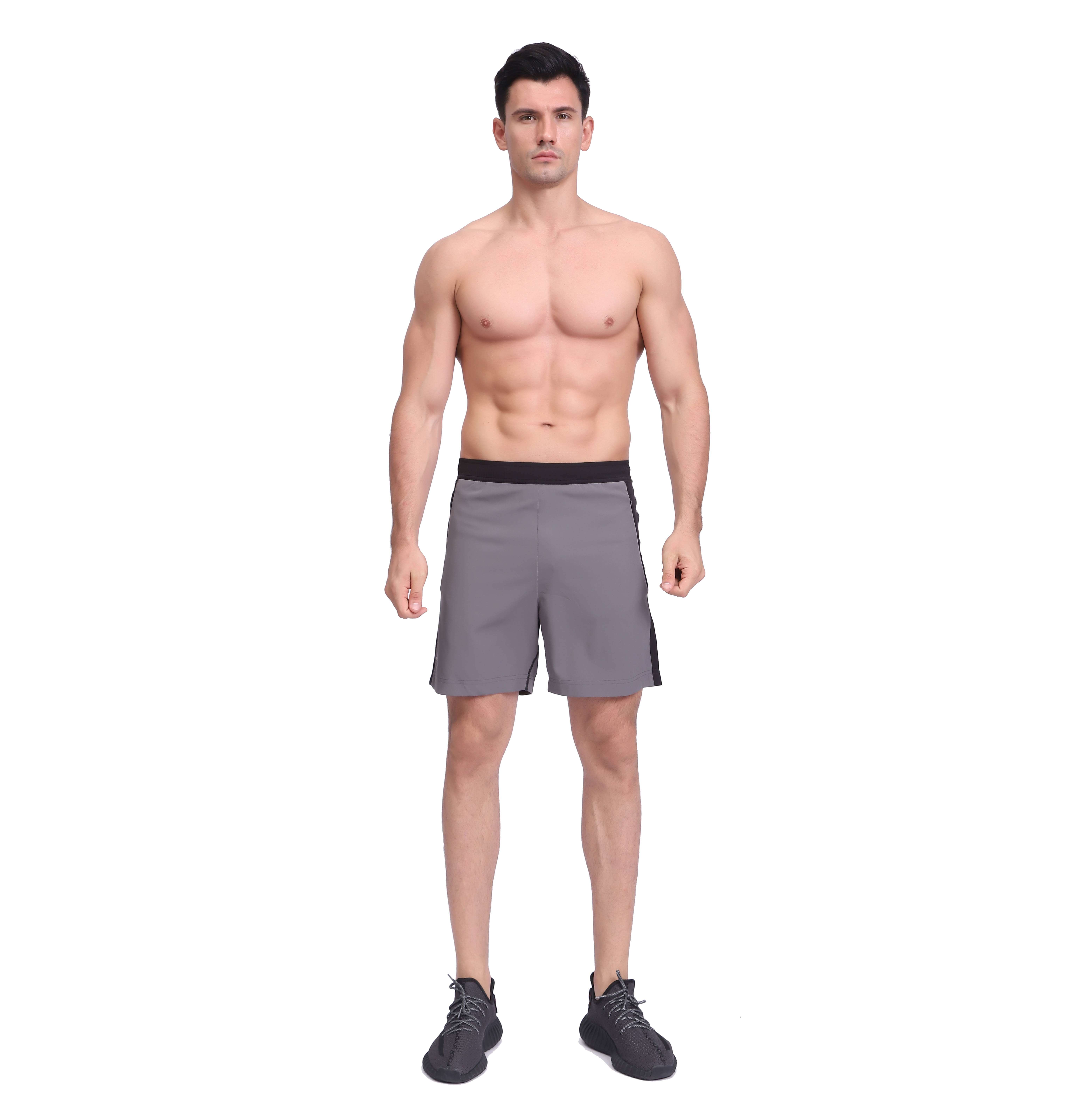 Shorts de running elásticos de secado rápido con bloques de colores para hombre