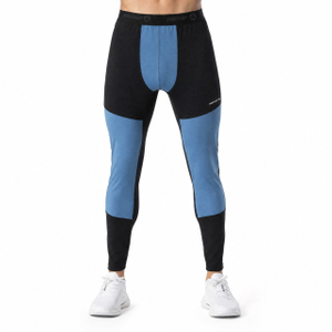 Legging de entrenamiento de carreras con paneles de protección contra el viento para hombre