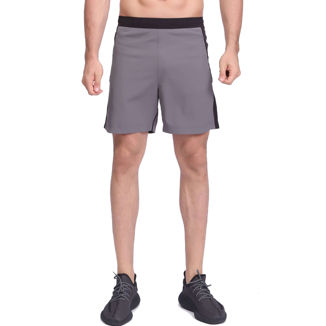 Shorts de running elásticos de secado rápido con bloques de colores para hombre